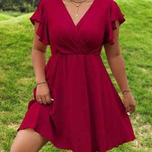 Selling this red dress brand new never worn just trying to clean out my closet .